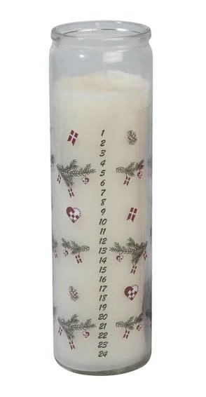 White calendar candle in glass with fir branches