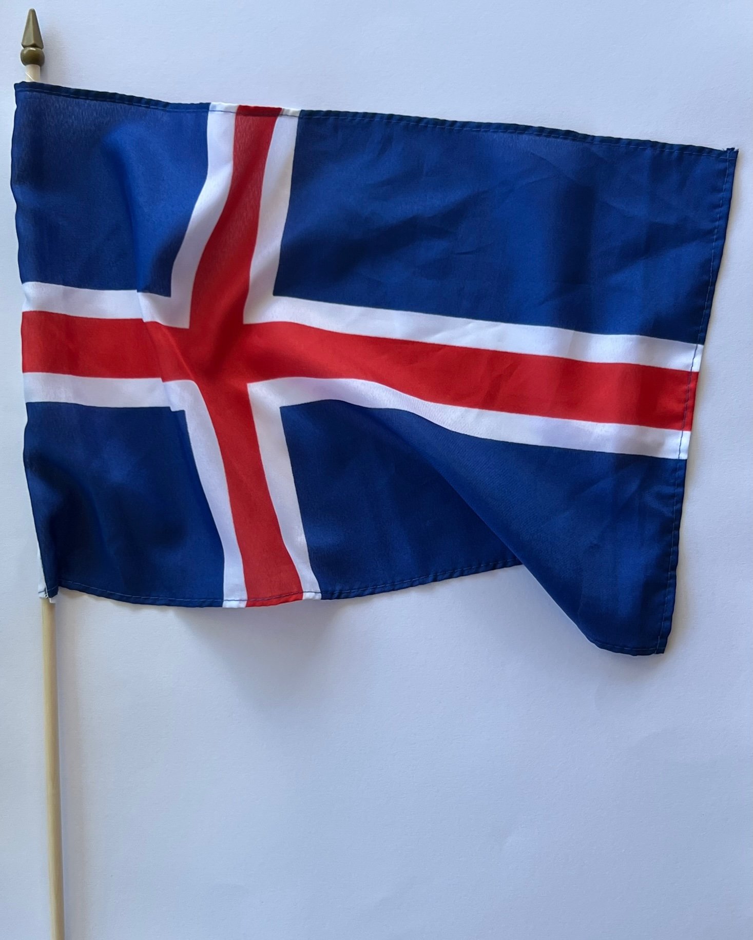 Icelandic flag on wooden stick